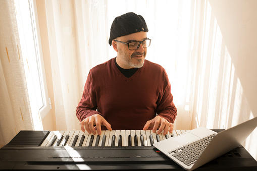 Adult piano student Online Piano Lessons for adults